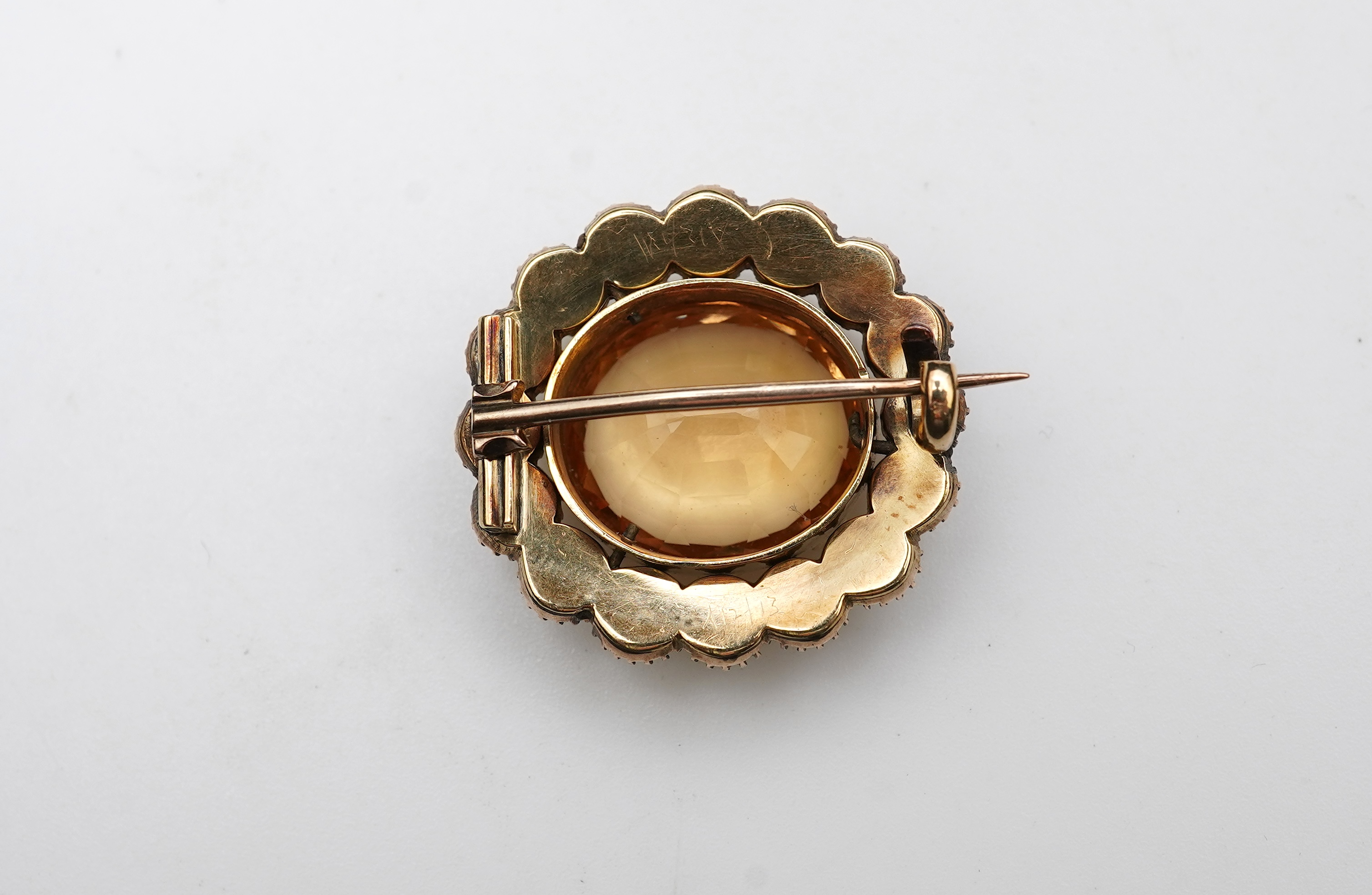 A Victorian topaz and pearl brooch, late 19th century